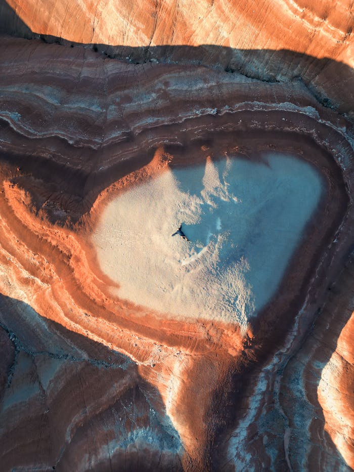A captivating aerial view of Utahs colorful and eroded geological formations.
